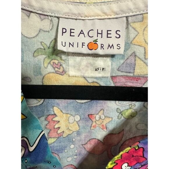 Peaches Day At the Beach Tropical Unisex Scrubs 3-Pocket Front, Size XL - Picture 2 of 3
